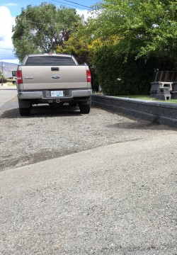 Allan Block wall and gravel parking place